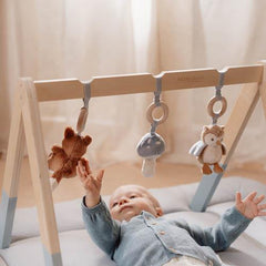 Little Dutch Baby Gym - Forest Friends, wooden baby play gym with hanging toys, including a fox, owl, and mushroom, for sensory and motor skill development.
