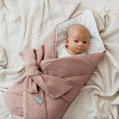 Sleepee Waffle Swaddle Blanket with adjustable bow tie and anti-allergic filling, providing comfort and security for newborns.