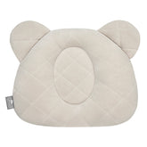 Sleepee Velvet Teddy Bear Pillow with indent for flat head prevention, matching velvet swaddle blankets for a stylish newborn set.