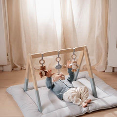 Little Dutch Baby Gym - Forest Friends, wooden baby play gym with hanging toys, including a fox, owl, and mushroom, for sensory and motor skill development.

