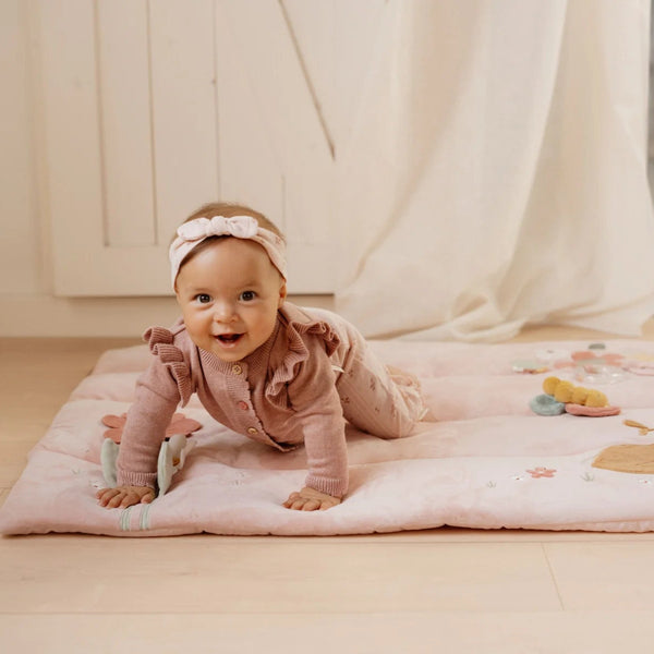 Little Dutch Playpen Mat - Fairy Garden featuring soft deer, butterfly, and crinkly textures in a pink whimsical design.