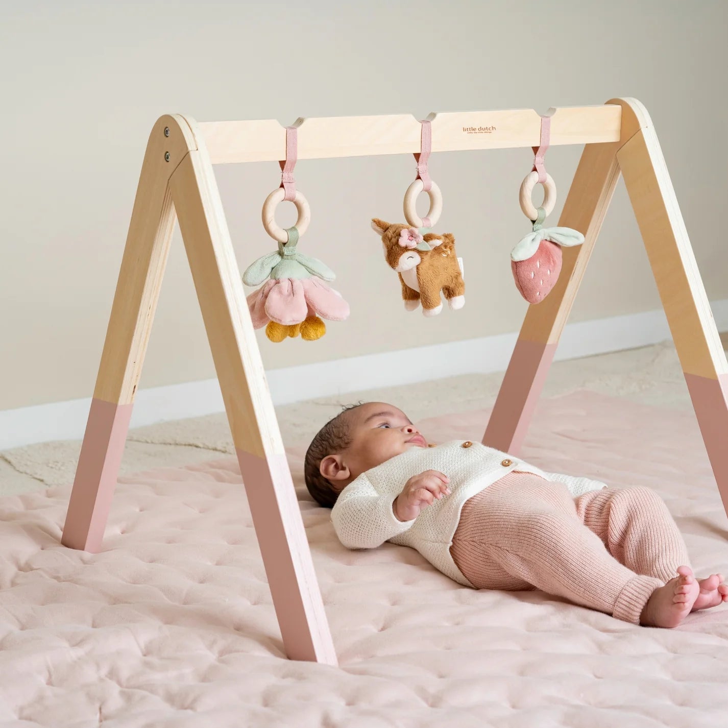 Little Dutch Baby Gym – Fairy Garden, featuring soft pastel colors, hanging fairies, butterflies, and flowers, designed for sensory play and early development.