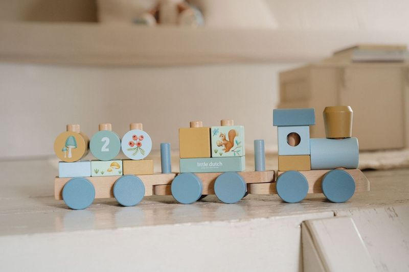 Little Dutch Stacking Train - Forest Friends, a wooden stacking toy with colorful blocks and woodland designs for toddlers aged 2 and up.