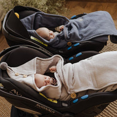 Baby cosy on the go with Sleepee muslin car seat blanket, breathable lightweight travel layer for car journeys