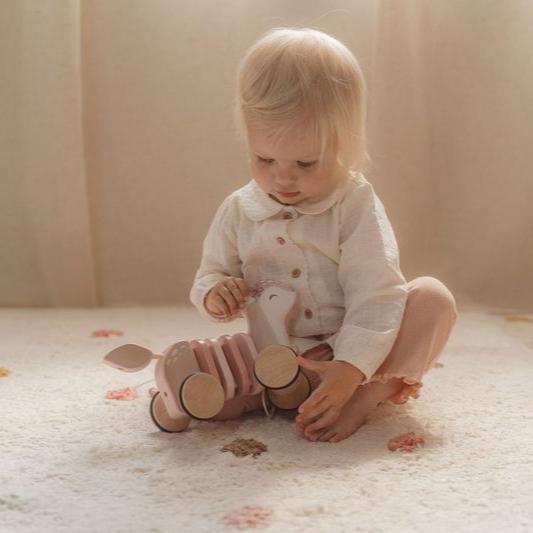 Little Dutch Pull-Along Wood Deer - Fairy Garden with colorful rings, designed for toddlers to pull along and promote motor skill development during play.