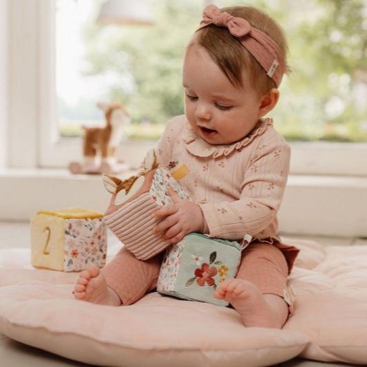 Little Dutch Set of Soft Cubes - Fairy Garden featuring colorful textures, sounds, and a soft floral mirror for sensory play.