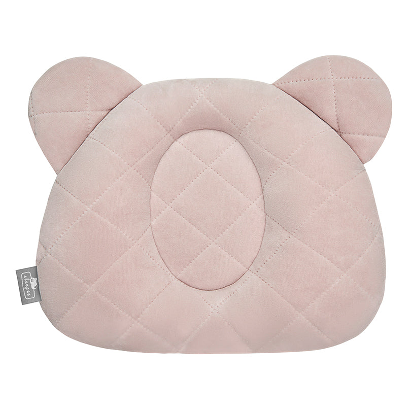 Sleepee Velvet Teddy Bear Pillow with indent for flat head prevention, matching velvet swaddle blankets for a stylish newborn set.